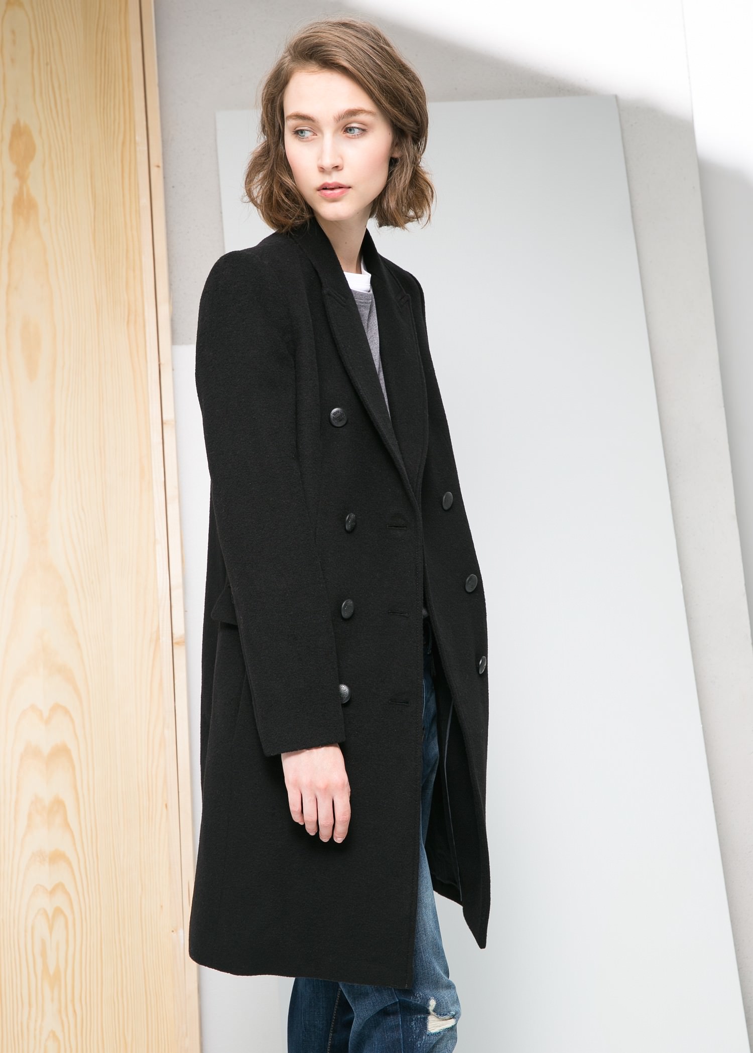 Schwarzer Mantel Mango